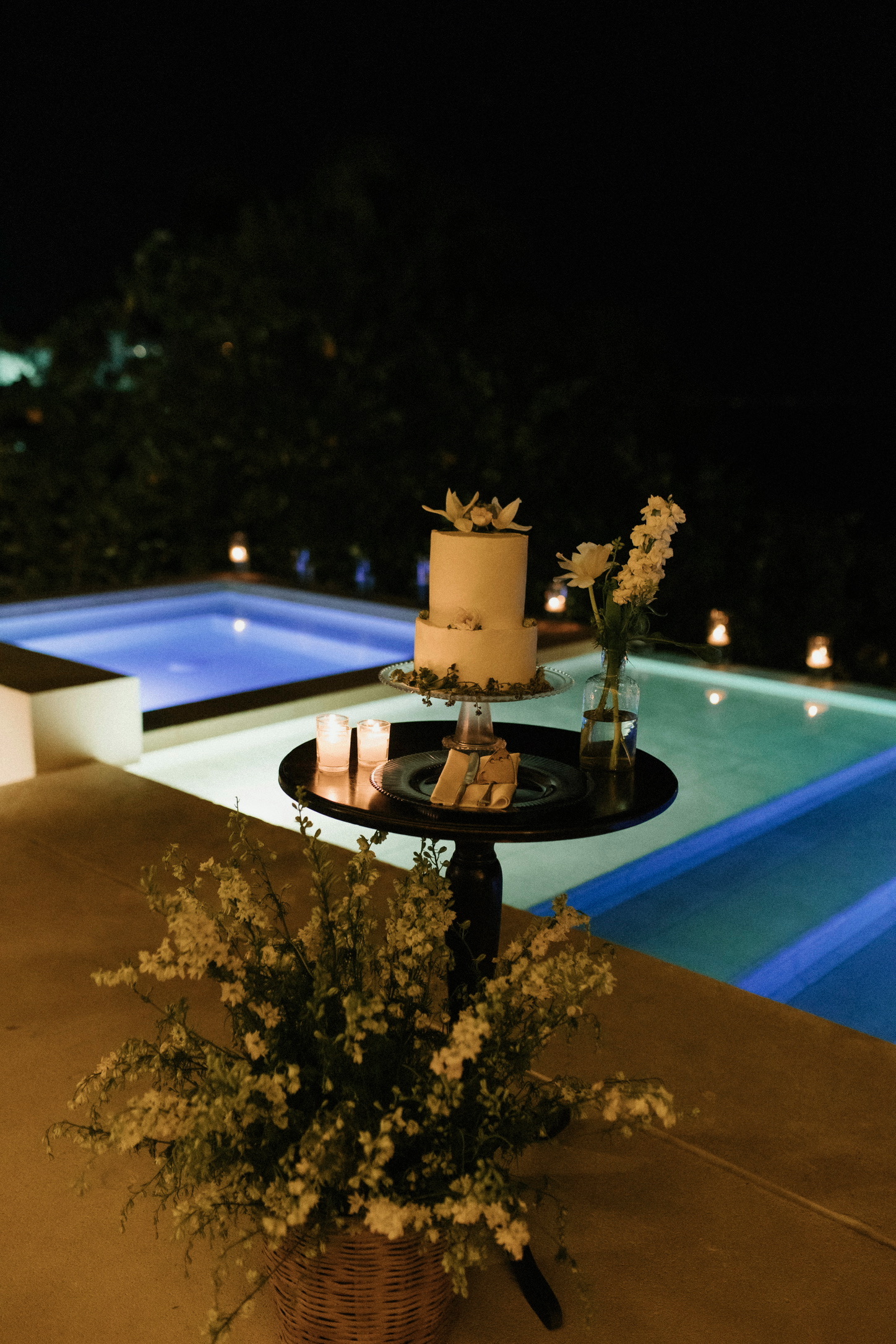 Wedding cake set beside the pool