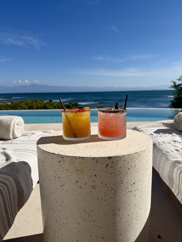 Poolside cocktails with an ocean view